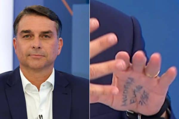 Flávio Bolsonaro copia o pai e exibe anotações na mão em sabatina da Globo