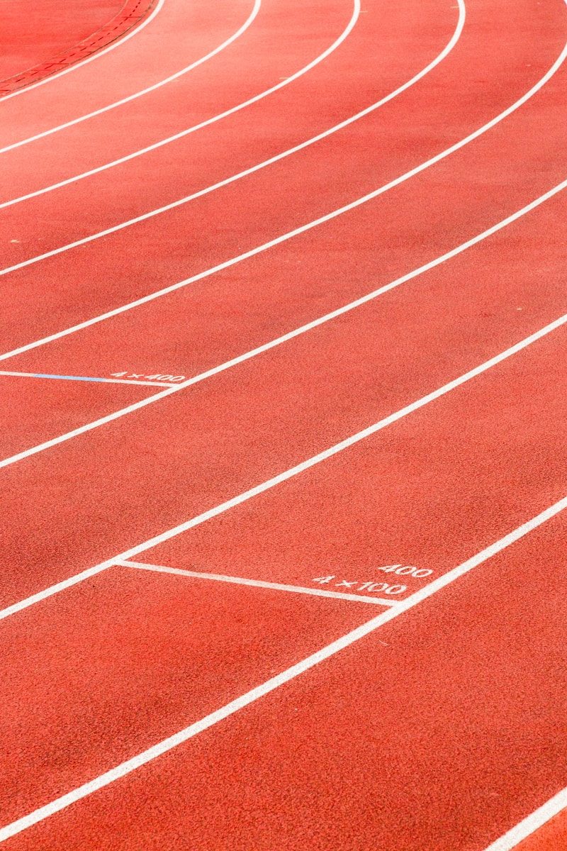 red running track lane markings
