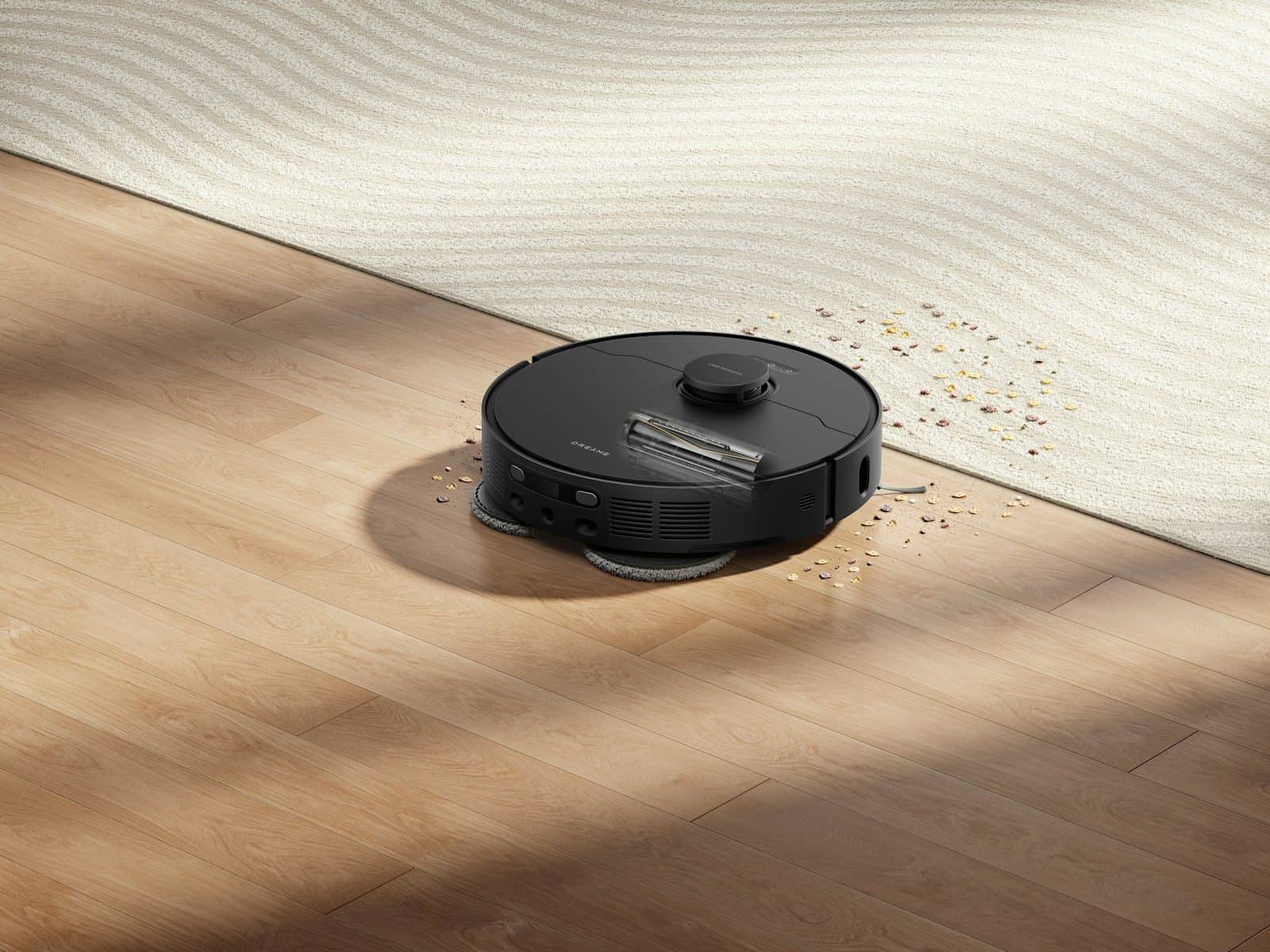 Robot vacuum cleaning spilled water and debris on floor