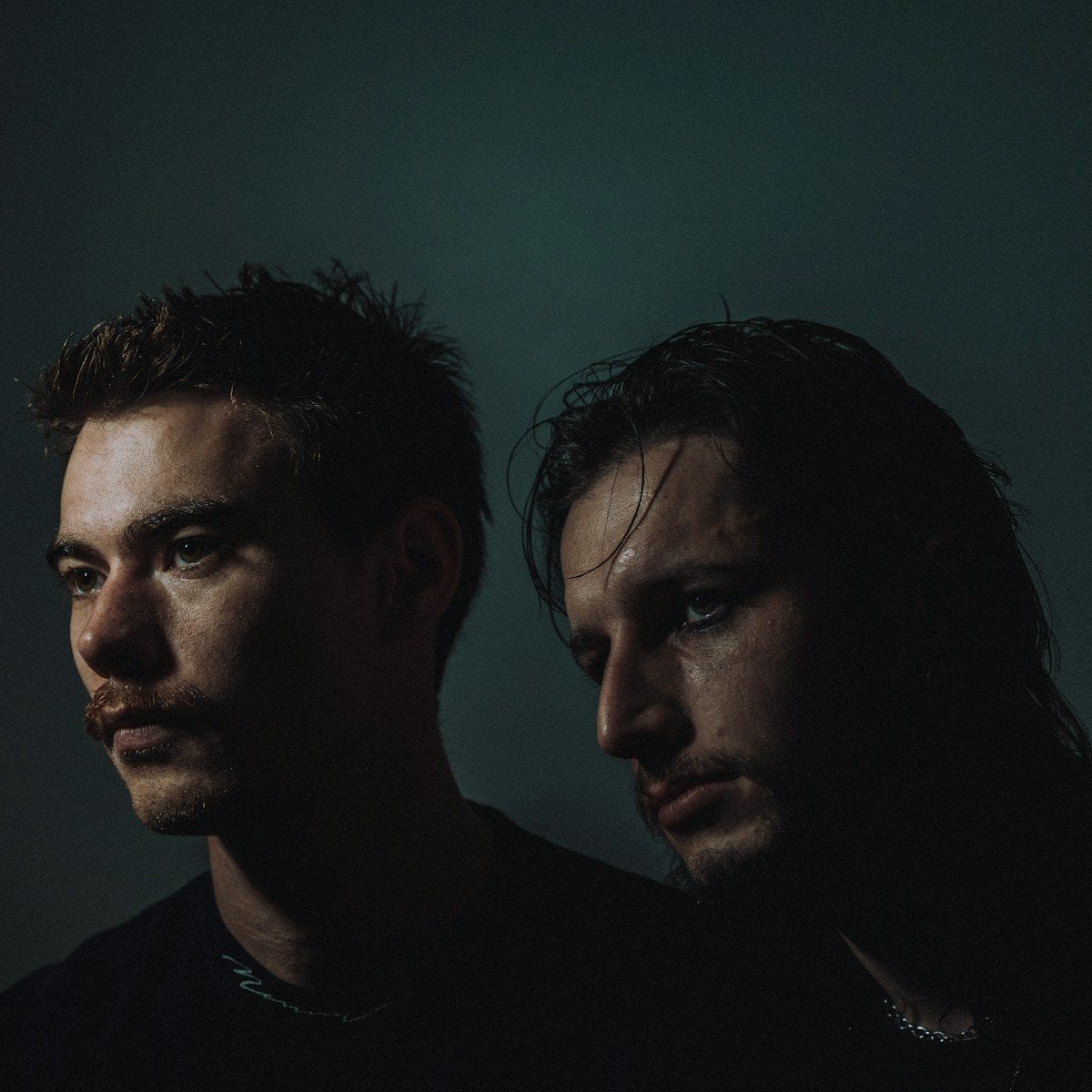 two men looking at camera