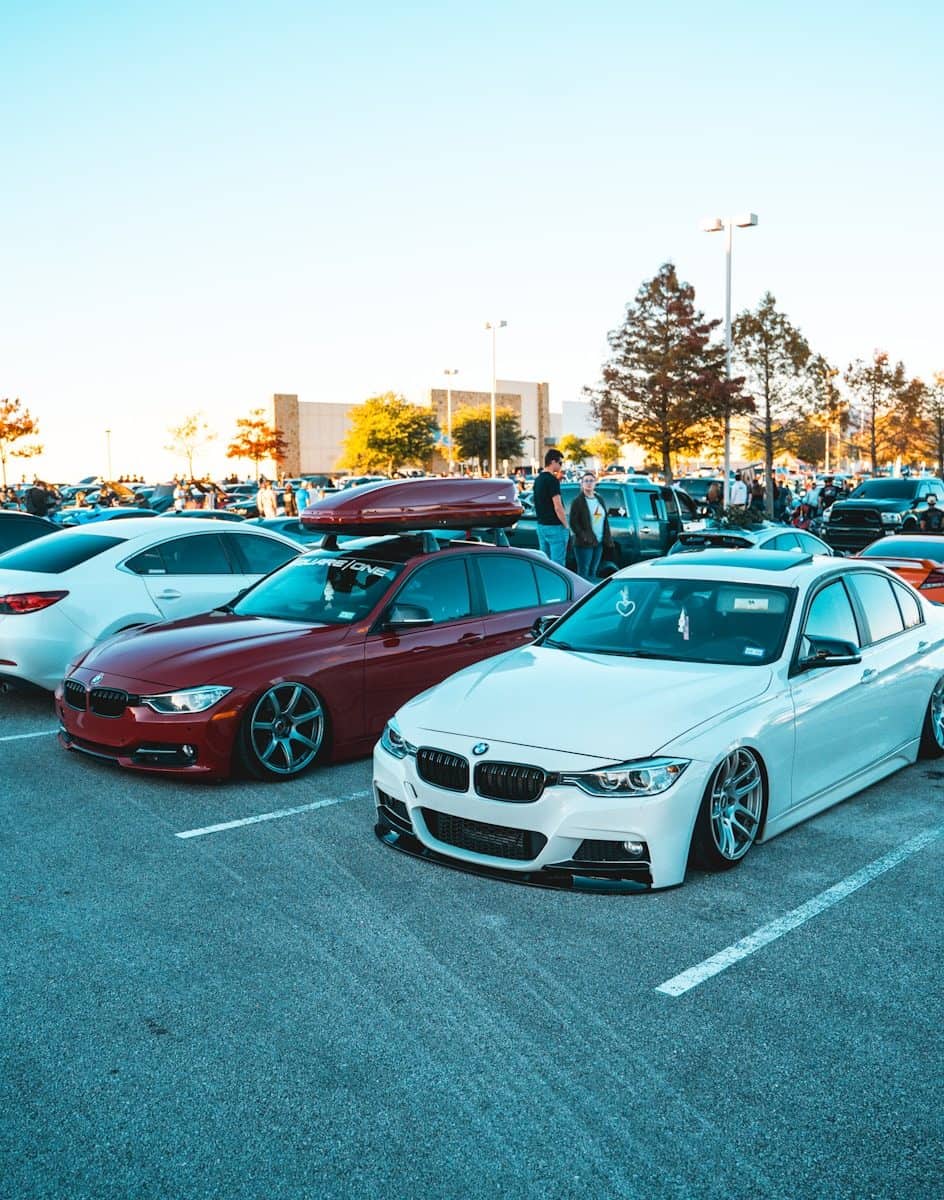 a group of cars parked in a parking lot