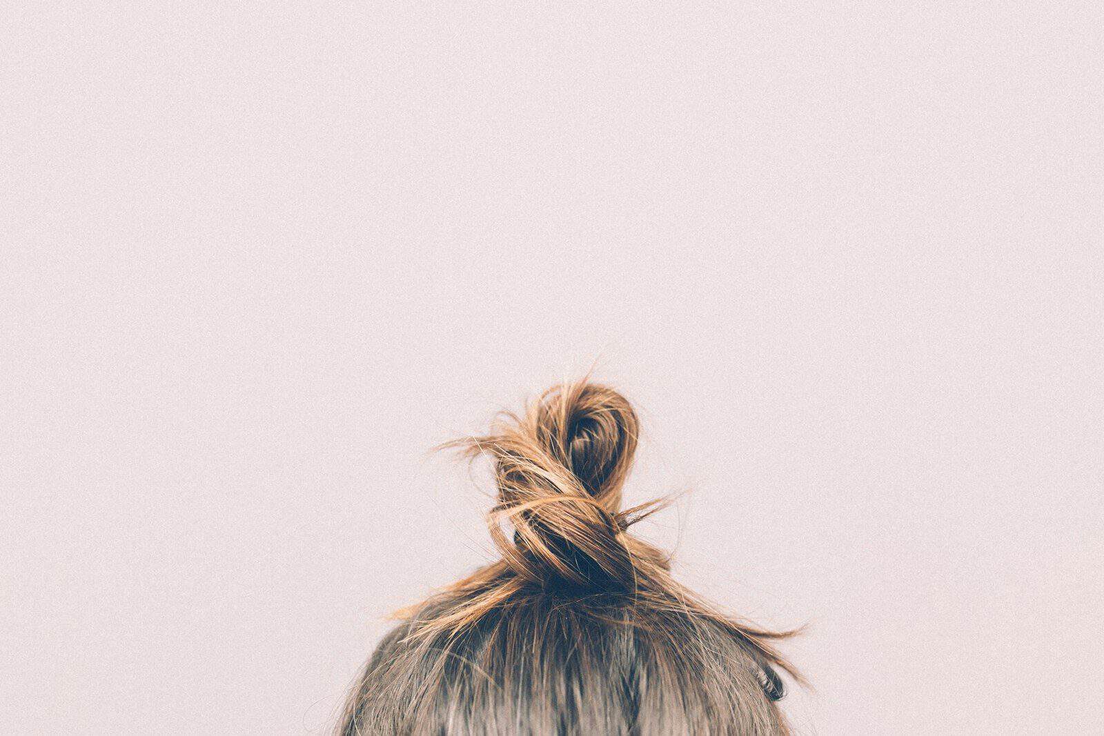 brown and black hair on white background
