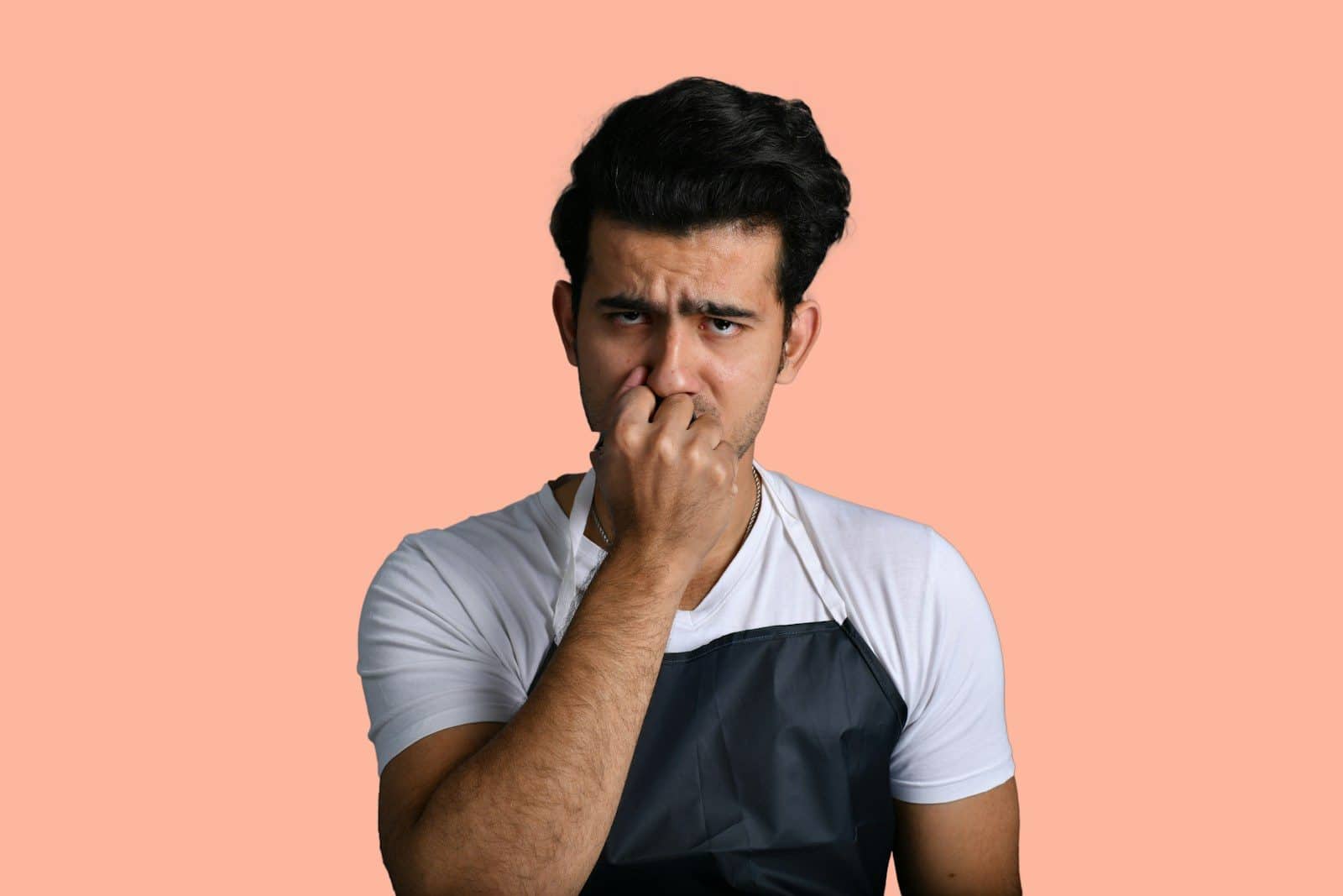 a man with his hand on his chin